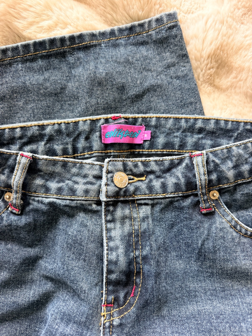 Edikted Blue Denim Flare Jeans with Pink Logo Accents
